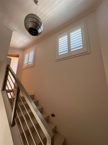 Hinged Infinity Shutters In A Stairwell